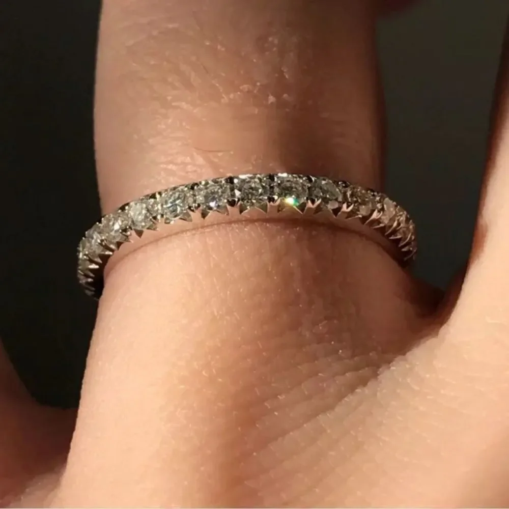 Round brilliant eternity wedding band